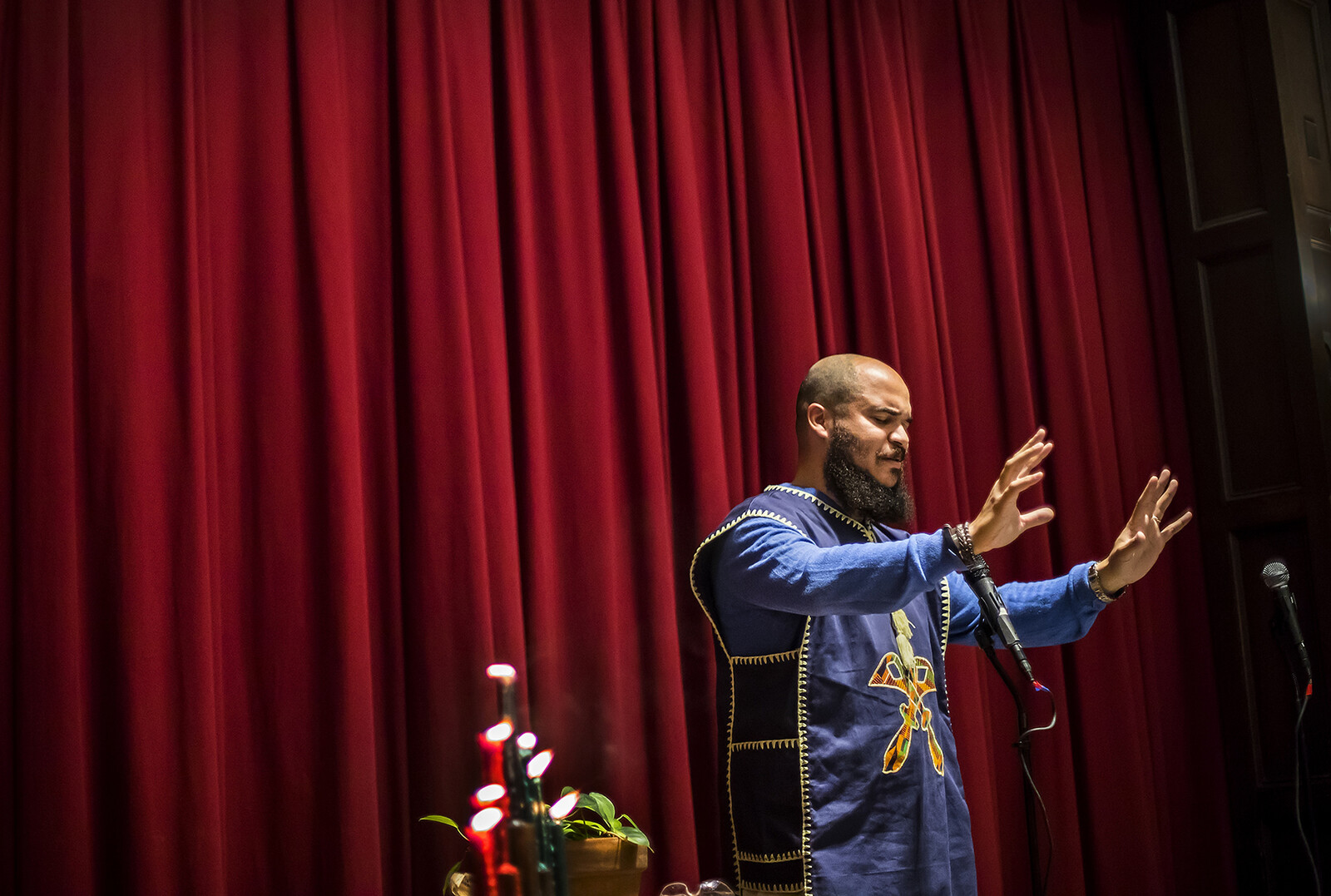 university chaplain during prayer service